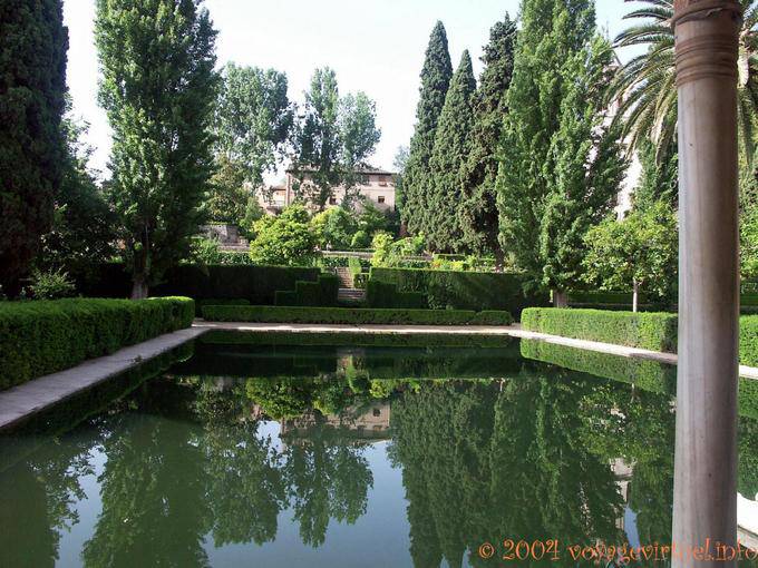 Reflection in a pool, Alhambra Nasrid Granada - Spain