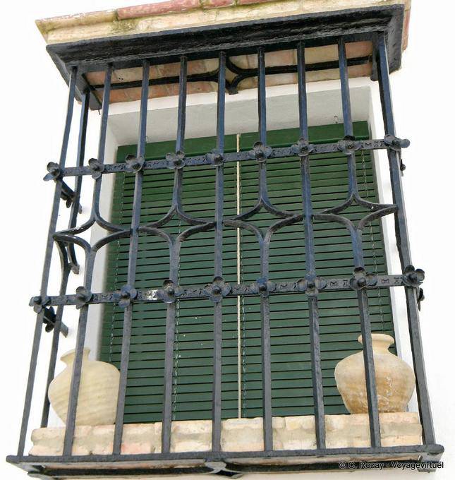 Ironwork on window Arquillo of San Felipe, Carmona - Spain