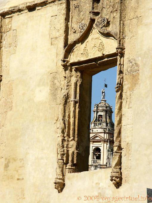 Antique window with views of the Giralda, Cordoba - Spain, Andalusia