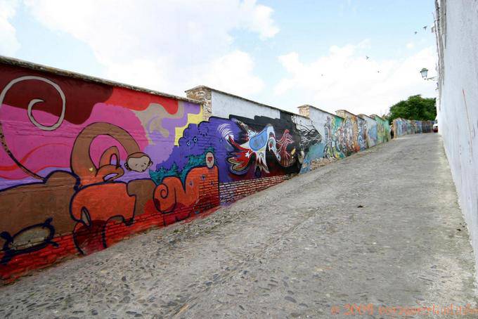 Tags on the wall in Albaicin, Granada - Spain