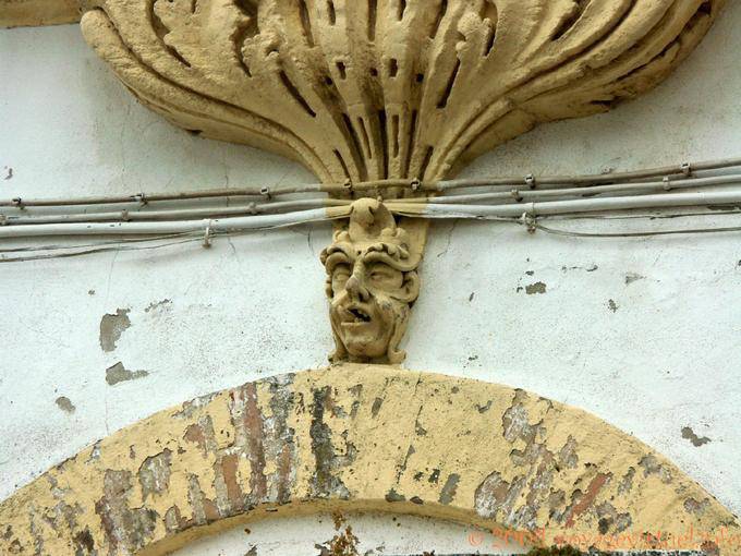 Head sticking his tongue out at the foot balcony, Medina de Sidonia - Spain