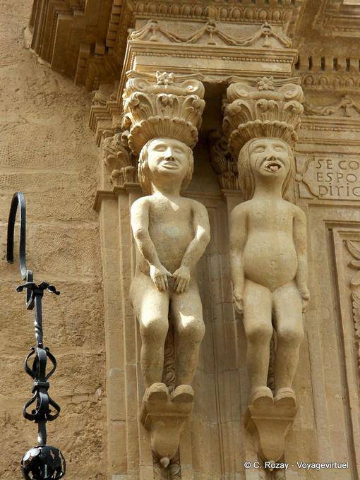 Close-up on the statues of the pillars of the palace Calle Marqués de Salvatierra, Ronda - Spain, Andalusia
