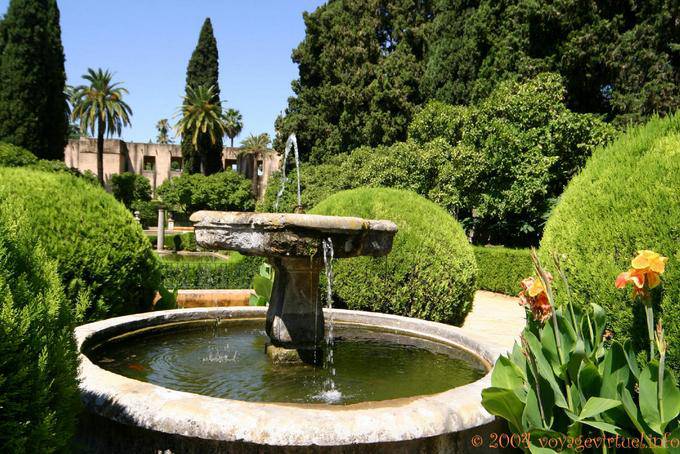 Topiary and fountain in the garden, Seville Alcazar - Spain