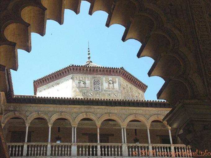 Viewed from arcade in the courtyard of the Demoiselles, Seville Alcazar - Spain