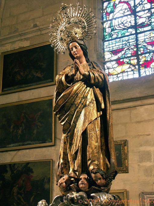 Statue of the Virgin walking on three heads, Seville Cathedral - Spain