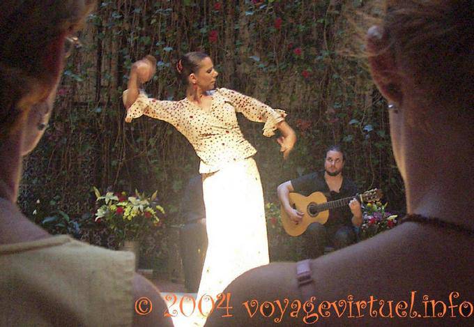 Flamenco dancer between two heads, Seville - Spain, Andalusia