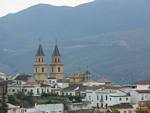 Double bell tower of the Iglesia Nuestra Senora de la Expectación of Orgiva, Alpujarras, Spain.