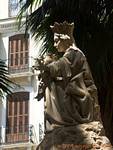Statue of Queen and his son, calle Santa Maria, Malaga, Spain.