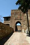 Fortified entrance gate (Puerta de la Bóveda) of the Alcazaba, Malaga, Spain.