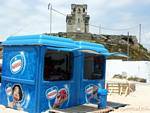 Merchant of ice at the foot of Castello, Tarifa, Spain.