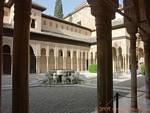 View from the arcades of the Court of Lions, Alhambra Nasrid Granada, Spain.
