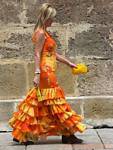 The beautiful Andalusian orange dress, Granada, Spain.