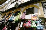 Suspended flamenco dresses, Granada, Spain.