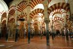 Marble columns forest underlying double arcades, Cordoba Mezquita, Spain.