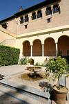 Small fountain in a patio, Seville Alcazar, Spain.