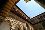 Arcades in the courtyard of the maidens, Alcazar Seville, Spain.