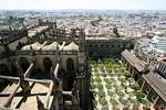 View of the Patio de los Naranjos and the Puerta del Perdon from the top of the Giralda, Seville Cathedral, Spain.