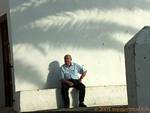 Old sitting on a bench, Vejer de la Frontera, Spain.