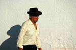 Andalusian and its shadow, Vejer de la Frontera, Spain.