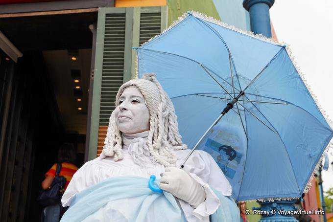 La Boca, Caminito, a mime under a blue umbrella, Buenos Aires - Argentina