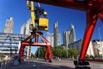 Harbor cranes and buildings in Puerto Madero, Buenos Aires, Argentina.