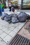Poverty sorting trash to recover, Plaza San Martin, Mendoza, Argentina.