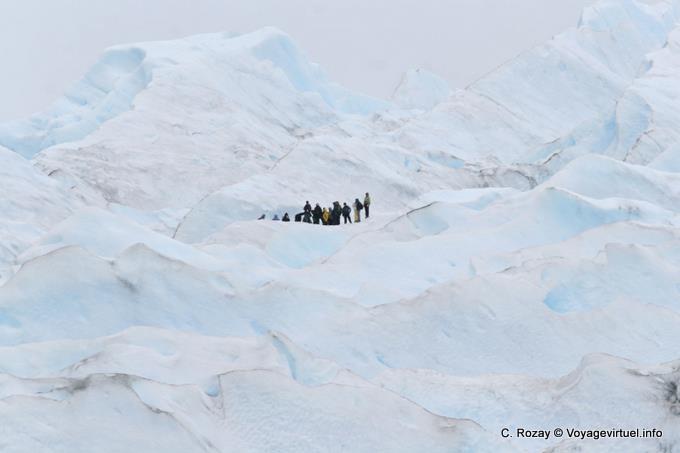 Group of tourists in mini-trekking, Perito Moreno Glacier, El Calafate - Argentina