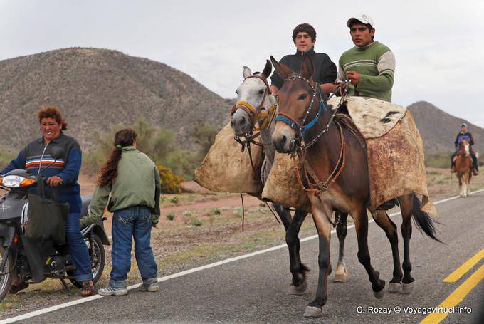 Local faces in a procession chaval, Ruta 40 after Chilecito - Argentina