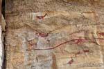 Fresco animals made in iron oxide, cave painting Tehuelche, Walichu, Argentina.