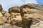 Faces in the cliff, archaeological site Tehuelche, Walichu, Argentina.