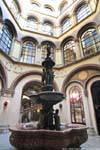 Freyung Ferstel Palace, Fountain of the Danube Sprites, Vienna - Austria.