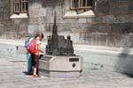 Stefansdom, children in front of a reproduction, Vienna - Austria.