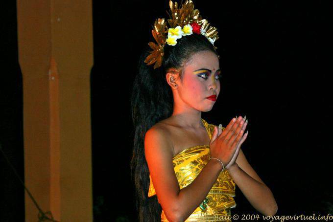 Posture with clasped hands of the young dancer, dance Ramayana - Bali