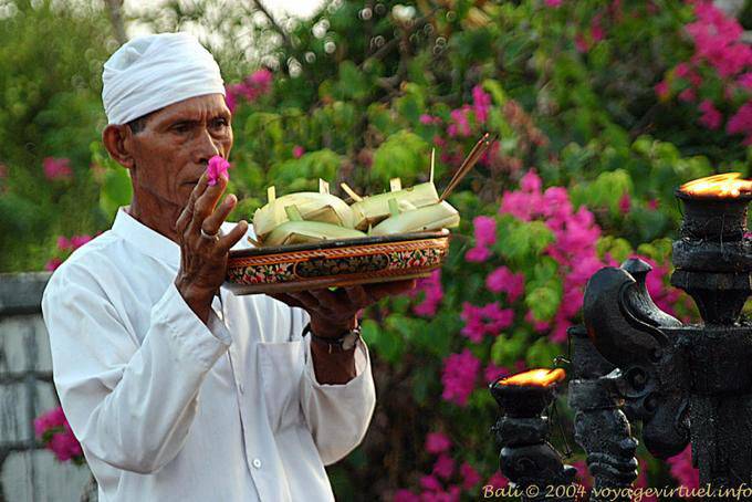 Priest and offerings to Uluwatu - Bali