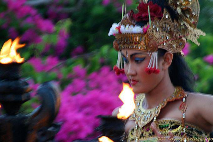 Dancer under his helmet flower, Kecak dance at Uluwatu - Bali