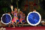 Open umbrellas and Martial dancers, Barong Ubud, Bali.