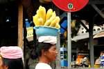 Candidasa corn cobs on head, Bali.