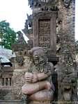 Stone guardian who laughs, Sangsit Pura Beji, Bali.