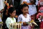 Girls with Balinese offerings, Sangsit Pura Beji, Bali.