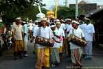 Religious procession in a street Sangsit, Pura Beji, Bali.