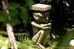 Stone statue on the head, Taman Burung, Bali.