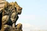 Statue with long teeth Uluwatu, Bali.