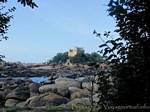 Costaérès Castle seen from the pink granite coast, Brittany, France.