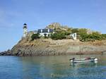 Lighthouse and house on the island towards Caramec Louët, Brittany, France.