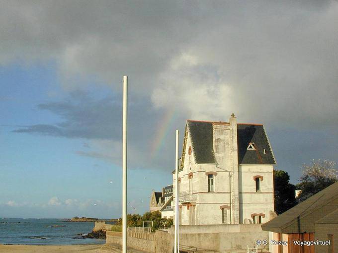 Rainbow sky on a Breton house Bénodet, Brittany - France