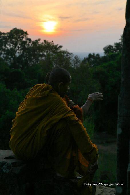 Monks and sunset Phnom Bakheng, Angkor, Cambodia