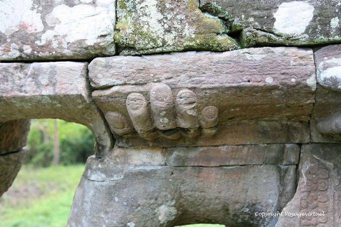 Hand close-up Victory Gate, Victory Gate, Angkor, Cambodia