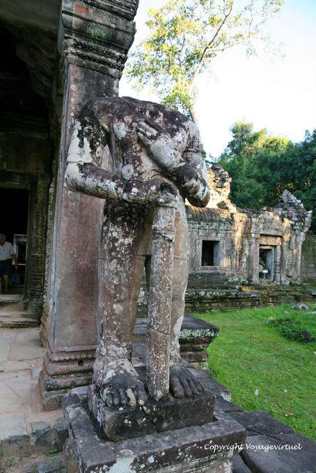 Colossal statue headless Dvarapala Preah Khan, Angkor, Cambodia
