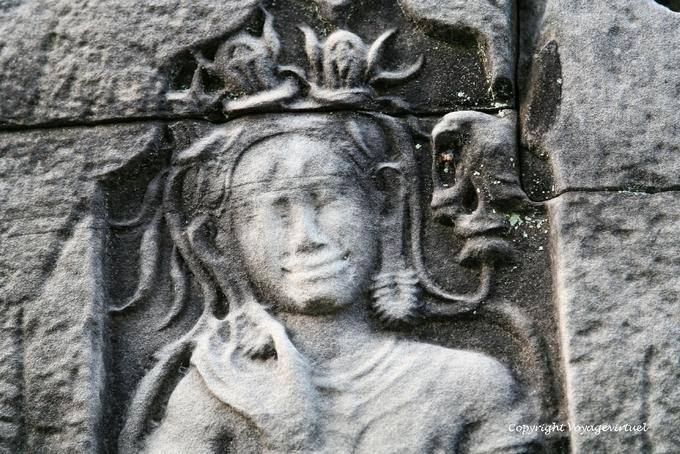 Female face blurred by time, Preah Khan, Angkor, Cambodia