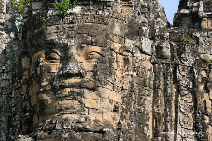 Royal power on one of the gates of Angkor Thom, Angkor, Cambodia